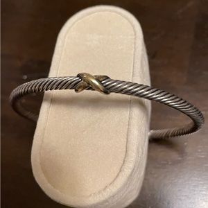 David Yurman silver and gold cable bracelet.